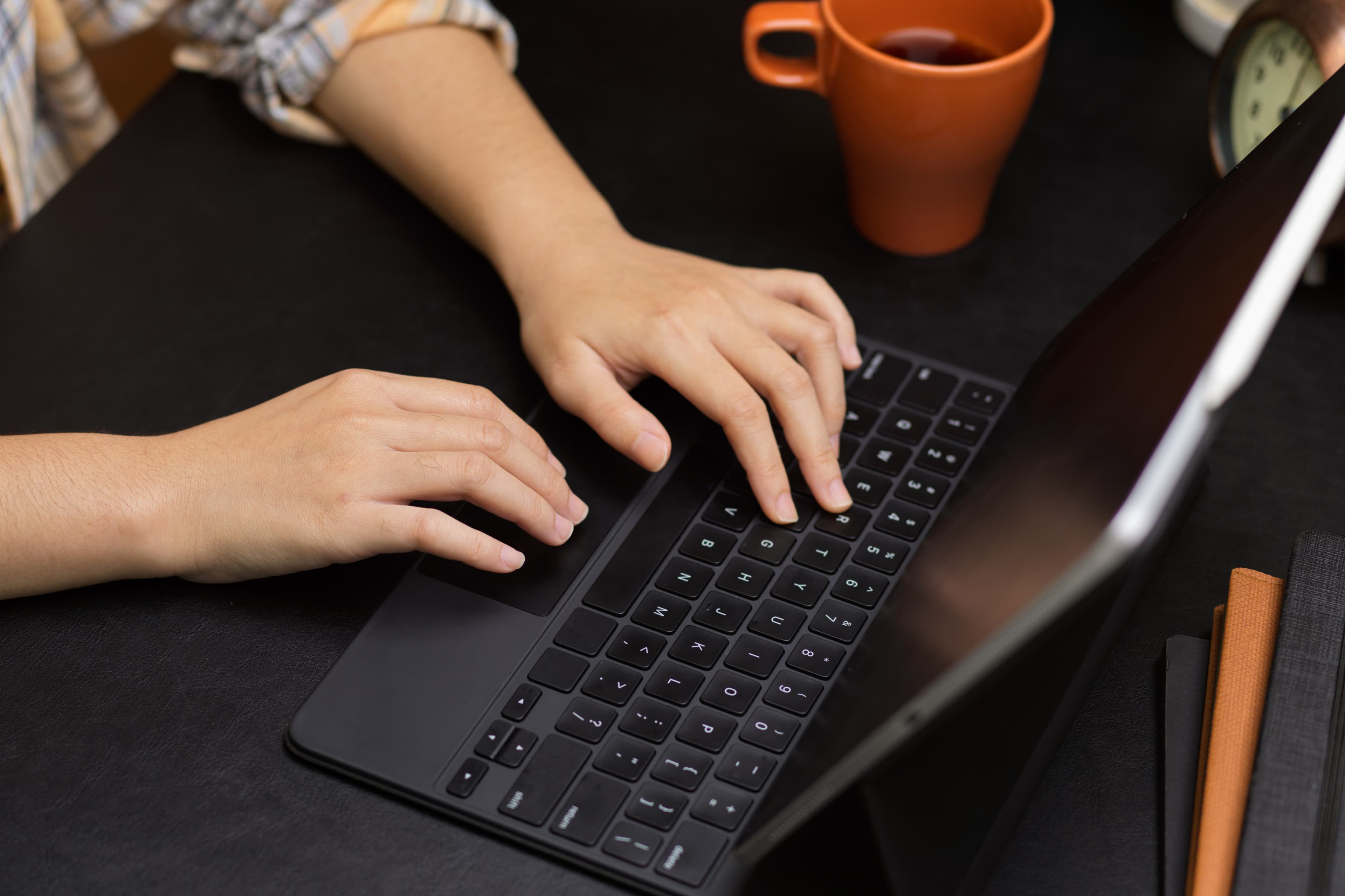 Person doing work on laptop